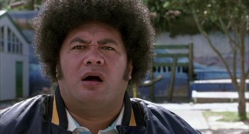 Movie still from “Eagle vs Shark” (2007), directed by Taika Waititi – A person wearing a jacket; Close Up shot, Low angle