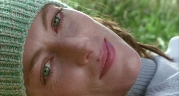 Movie still from “Eagle vs Shark” (2007), directed by Taika Waititi – A woman's face with green eyes; Extreme Close Up shot, Low angle