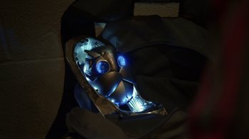 Movie still from “Earth to Echo” (2014), directed by Dave Green – The face of an iron man mask; Extreme Close Up shot, High angle