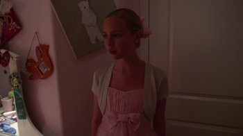 Movie still from “Earth to Echo” (2014), directed by Dave Green – A young girl in a pink dress and a white jacket; Medium shot, Low angle