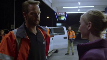 Movie still from “Earth to Echo” (2014), directed by Dave Green – A man and a woman are standing in a parking lot; Close Up shot, Over the shoulder angle