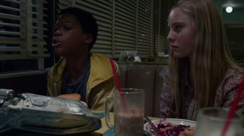 Movie still from “Earth to Echo” (2014), directed by Dave Green – Two people sitting at a table with food and drinks; Close Up shot, Over the shoulder angle