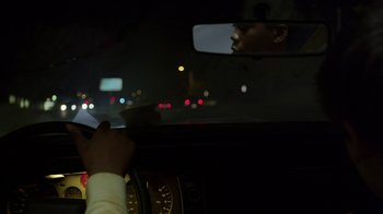 Movie still from “Earth to Echo” (2014), directed by Dave Green – A person is driving a car at night; Close Up shot, Over the shoulder angle