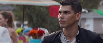 Movie still from “El Chicano” (2018), directed by Ben Hernandez Bray – A person looking to his left; Close Up shot, Over the shoulder angle