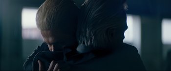 Movie still from “El Chicano” (2018), directed by Ben Hernandez Bray – A man is holding a knife in his mouth; Close Up shot, Over the shoulder angle