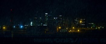 Movie still from “El Chicano” (2018), directed by Ben Hernandez Bray – A view of a city at night from a distance; Extreme Wide shot, High angle