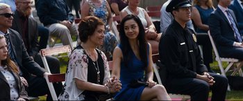 Movie still from “El Chicano” (2018), directed by Ben Hernandez Bray – Two women sitting next to each other on a bench; Medium shot, Over the shoulder angle