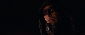 Movie still from “El Chicano” (2018), directed by Ben Hernandez Bray – A person wearing a hood; Close Up shot, Low angle