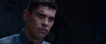 Movie still from “El Chicano” (2018), directed by Ben Hernandez Bray – A person with a bandage on his face; Close Up shot, Over the shoulder angle