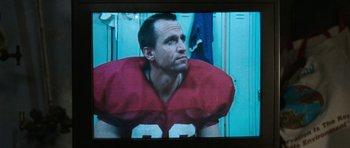 Movie still from “Election” (1999), directed by Alexander Payne – A person wearing a football uniform; Close Up shot, Low angle