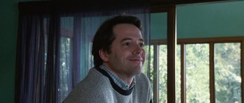 Movie still from “Election” (1999), directed by Alexander Payne – A person wearing a sweater; Close Up shot, Low angle