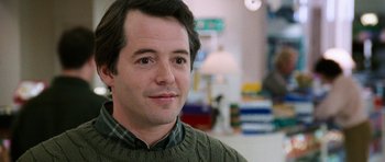 Movie still from “Election” (1999), directed by Alexander Payne – A person wearing a sweater; Close Up shot, Over the shoulder angle