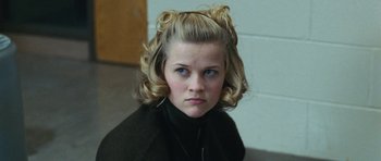 Movie still from “Election” (1999), directed by Alexander Payne – A young woman with blonde hair and blue eyes; Close Up shot, Low angle