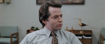 Movie still from “Election” (1999), directed by Alexander Payne – A person wearing a shirt and a tie; Close Up shot, Over the shoulder angle