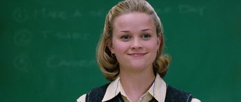 Movie still from “Election” (1999), directed by Alexander Payne – A person wearing a shirt and vest; Close Up shot, Low angle