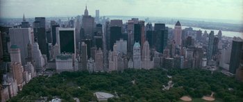 Movie still from “Election” (1999), directed by Alexander Payne – A view of a large city from a helicopter; Extreme Wide shot, High angle