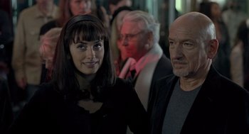 Movie still from “Elegy” (2008), directed by Isabel Coixet – A man and a woman standing next to each other; Close Up shot, Over the shoulder angle