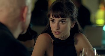 Movie still from “Elegy” (2008), directed by Isabel Coixet – A person sitting in a room; Close Up shot, Over the shoulder angle