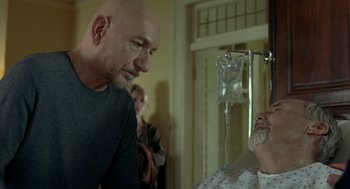 Movie still from “Elegy” (2008), directed by Isabel Coixet – An older man and a younger woman in a hospital room; Close Up shot, Over the shoulder angle