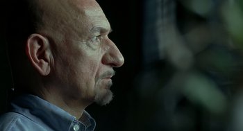 Movie still from “Elegy” (2008), directed by Isabel Coixet – An older man with a beard looking to his left; Close Up shot, Low angle