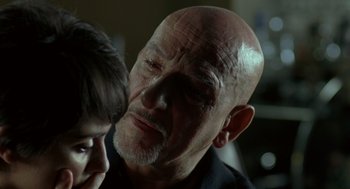 Movie still from “Elegy” (2008), directed by Isabel Coixet – An older man and a young woman looking into each others eyes; Close Up shot, Over the shoulder angle