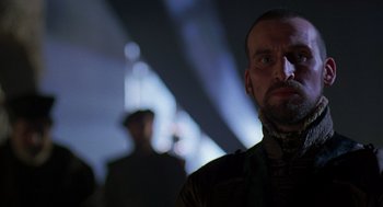 Movie still from “Elizabeth” (1998), directed by Shekhar Kapur – A person in a dark room; Close Up shot, Low angle