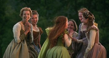 Movie still from “Elizabeth” (1998), directed by Shekhar Kapur – A group of people dressed in period clothing; Medium shot, Low angle