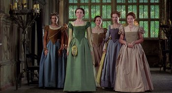 Movie still from “Elizabeth” (1998), directed by Shekhar Kapur – A group of women dressed in period costumes; Medium shot, Low angle