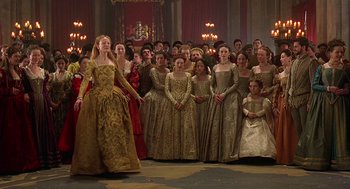 Movie still from “Elizabeth” (1998), directed by Shekhar Kapur – A group of people standing in a room; Wide shot, High angle