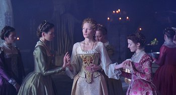 Movie still from “Elizabeth” (1998), directed by Shekhar Kapur – A group of women dressed in medieval clothing; Medium shot, Low angle