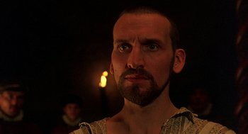 Movie still from “Elizabeth” (1998), directed by Shekhar Kapur – A person with a beard; Close Up shot, Low angle