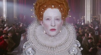 Movie still from “Elizabeth” (1998), directed by Shekhar Kapur – A person wearing a costume; Close Up shot, Low angle