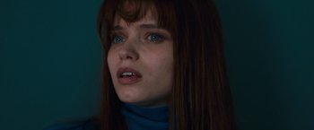 Movie still from “Elizabeth Harvest” (2018), directed by Sebastian Gutierrez – A person with long brown hair; Close Up shot, Low angle