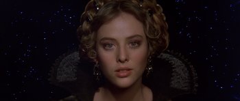 Movie still from “Dune” (1984), directed by David Lynch – A person wearing a dress; Close Up shot, Over the shoulder angle