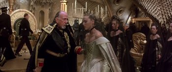 Movie still from “Dune” (1984), directed by David Lynch – A man and a woman dressed in medieval garb; Medium shot, Over the shoulder angle