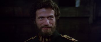 Movie still from “Dune” (1984), directed by David Lynch – A person with a beard; Close Up shot, Low angle