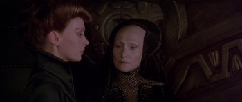 Movie still from “Dune” (1984), directed by David Lynch – A woman and a man are looking at each other; Close Up shot, Over the shoulder angle