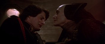 Movie still from “Dune” (1984), directed by David Lynch – Two people are looking at each other in a room; Close Up shot, Over the shoulder angle