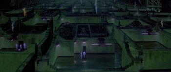 Movie still from “Dune” (1984), directed by David Lynch – Two people are standing in a dark room; Extreme Wide shot, High angle