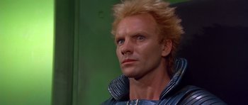 Movie still from “Dune” (1984), directed by David Lynch – A person wearing a jacket; Close Up shot, Low angle