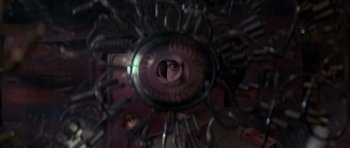 Movie still from “Dune” (1984), directed by David Lynch – A person's eye is seen through a bunch of keys; Extreme Close Up shot, Overhead angle