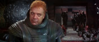 Movie still from “Dune” (1984), directed by David Lynch – A person wearing a costume; Close Up shot, Over the shoulder angle