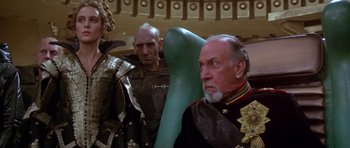 Movie still from “Dune” (1984), directed by David Lynch – A group of men standing next to each other in military uniforms; Medium shot, Low angle