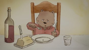 Movie still from “Ernest & Celestine” (2012), directed by Vincent Patar – A bear sitting in front of a bowl of food; Close Up shot, Low angle