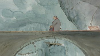 Movie still from “Ernest & Celestine” (2012), directed by Vincent Patar – An old man sitting on a bridge in a cave; Wide shot, High angle