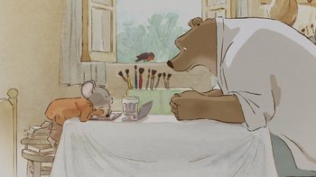 Movie still from “Ernest & Celestine” (2012), directed by Vincent Patar – A bear and a mouse sitting on a bed looking at a computer; Medium shot, High angle
