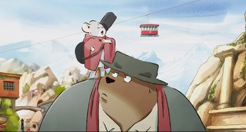 Movie still from “Ernest and Celestine: A Trip to Gibberitia” (2022), directed by Jean-Christophe Roger – A cartoon picture of a bear and a mouse in a hat; Wide shot, Low angle