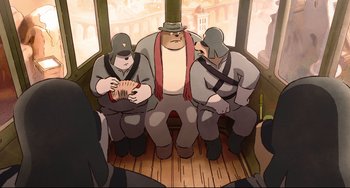 Movie still from “Ernest and Celestine: A Trip to Gibberitia” (2022), directed by Jean-Christophe Roger – A group of men sitting on top of a wooden bench; Wide shot, Low angle