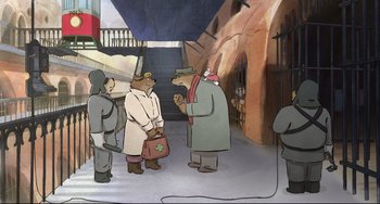 Movie still from “Ernest and Celestine: A Trip to Gibberitia” (2022), directed by Jean-Christophe Roger – A group of people standing around a building; Wide shot, High angle