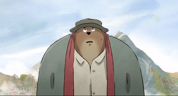 Movie still from “Ernest and Celestine: A Trip to Gibberitia” (2022), directed by Jean-Christophe Roger – An animated bear wearing a hat and a jacket; Close Up shot, Low angle